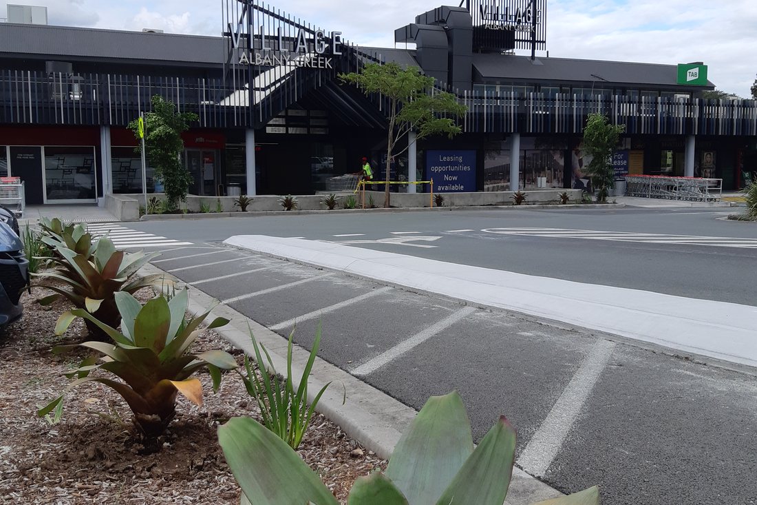 Albany Creek Village — finished landscape strip with feature foliage planting